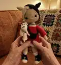 Doll Cruella Amigurumi Pattern step 4 - final assembly and finishing