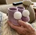 Plush Booties with Pompoms Pattern step 4 - final assembly and finishing
