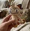 Meowth Amigurumi Pattern step 4 - final assembly and finishing