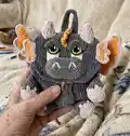 Baby Dino Backpack Amigurumi Pattern step 4 - final assembly and finishing