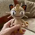 Meowth Amigurumi Pattern step 4 - final assembly and finishing