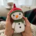 Snowman Amigurumi Pattern step 4 - final assembly and finishing