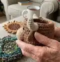 Mungo Highland Cow Crochet Coaster Set Amigurumi Pattern step 2 - assembly progress