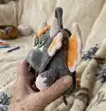 Baby Dino Backpack Amigurumi Pattern step 3 - details and accessories