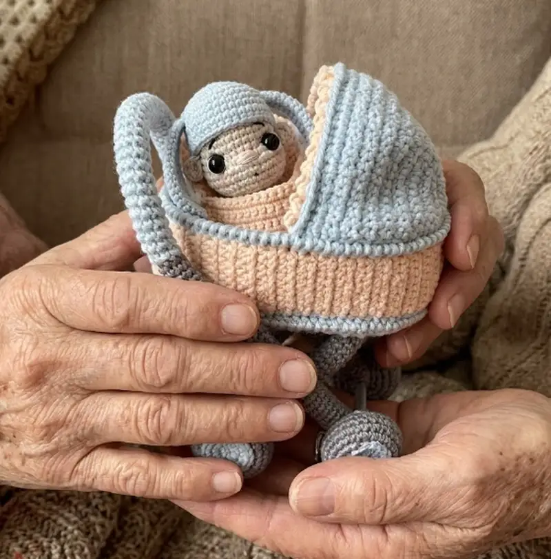 Complimentary Intermediate crochet pattern: Doll in a Baby-Carriage Amigurumi Pattern - Simple to follow guide