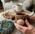 Mungo Highland Cow Crochet Coaster Set Amigurumi Pattern step 4 - final assembly and finishing