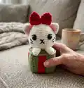 Christmas Giftbox Cat Amigurumi Pattern step 4 - final assembly and finishing