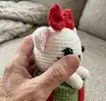Christmas Giftbox Cat Amigurumi Pattern step 3 - details and accessories