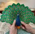 Peacock Amigurumi Pattern step 4 - final assembly and finishing