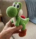 Yoshi Amigurumi Pattern step 4 - final assembly and finishing
